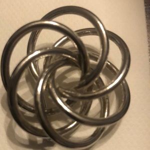 Silver tone wire circle pin.